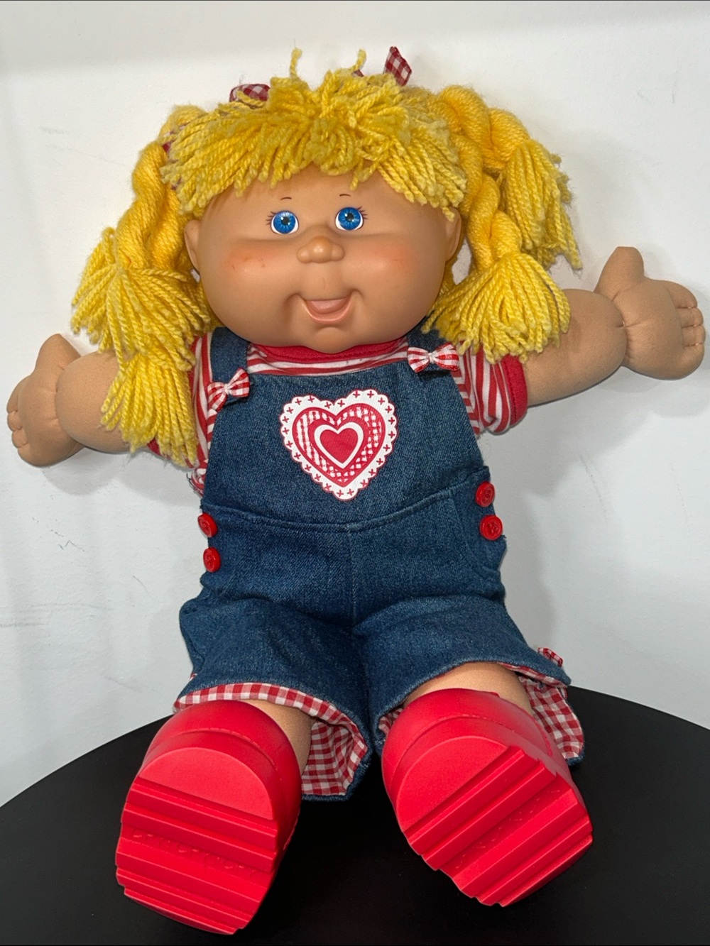 Vintage 2004 Play Along Cabbage Patch doll. Fully clothed with hair bows